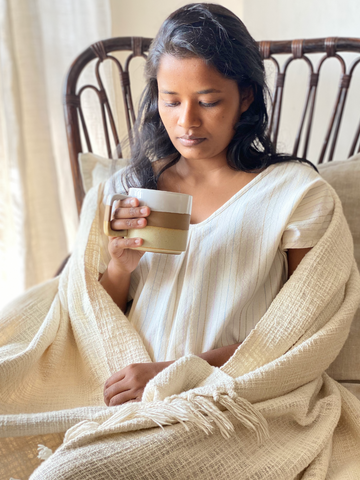 Model sipping chai tea while wearing our cotton loungewear for women 