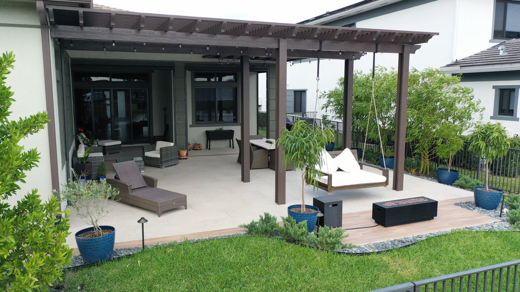 Porcelain Pavers And Pergola Create The Perfect Patio For This Home In Parkland, FL