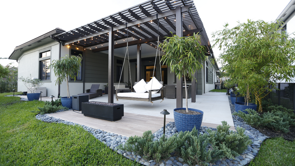 Porcelain Pavers And Pergola Create The Perfect Patio For This Home In Parkland, FL