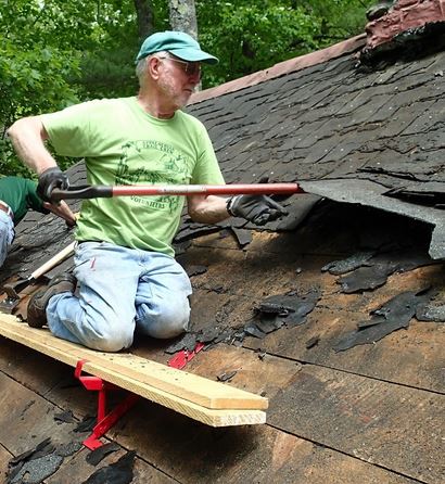 roofer with roofing brackets