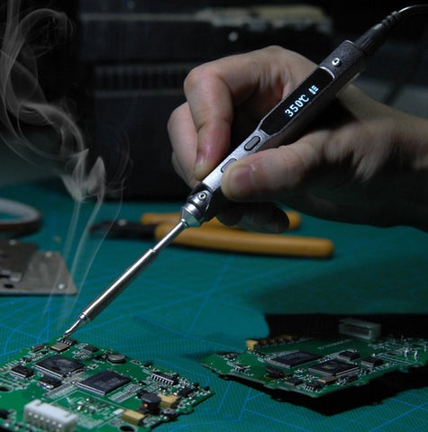 Soldering a drone circuit board