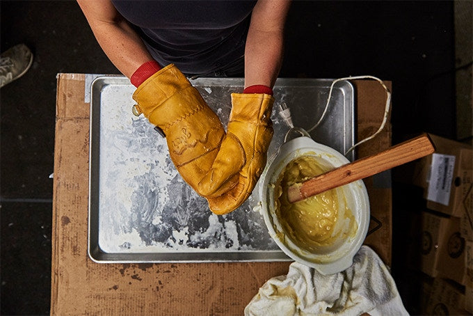 Hand waxing the Frontier Mittens