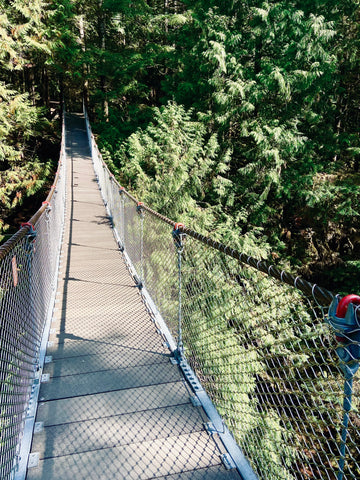 Lynn Canyon suspension bridge in North Vancouver, Lynn Canyon Park hiking Vancouver, easy accessible hiking trails in Vancouver BC, where to explore & hike in Vancouver Canada, easy hikes in Vancouver, visiting the Vancouver rainforest, where to see giant trees in Vancouver BC, outdoor swimming pools in Vancouver, unique places to swim in Vancouver BC, best parks in Vancouver, best suspension bridges in Vancouver, Vancouver views you can't miss, best views in Vancouver, top Vancouver sights, what to do in Vancouver British Columbia for a weekend, must do hikes in Vancouver, top Vancouver BC trails