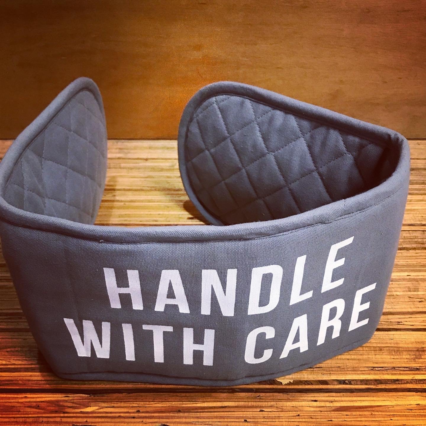"Handle with care" Oven mitts by The School of Life (UK)