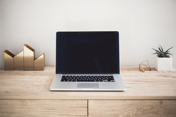 mac computer on brown table