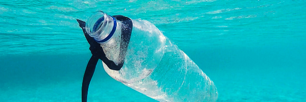 Plastic bottle floating in the ocean