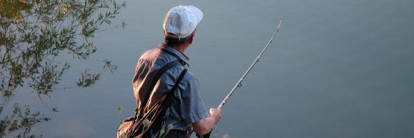 Fishing on banks of river - Luksea wearable blog