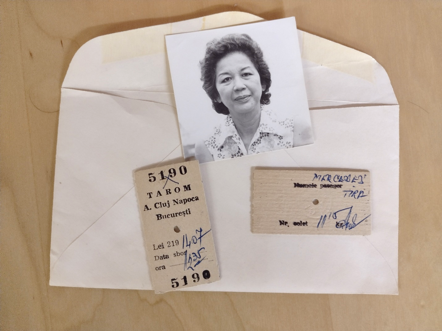 ID picture of an unknown Filipina woman, two Tarom airline tickets between the Romanian cities of Cluj-Napoca and Bucharest, circa 1970s. One of them is my mother’s.