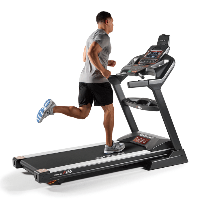 Man running on Sole F85 Treadmill