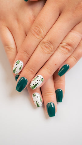 Green holiday nails with ‘Presents For Prada #133.’
