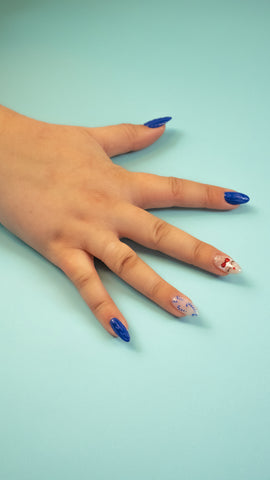 Blue holiday nails made with ‘Santa Social Club #138.’