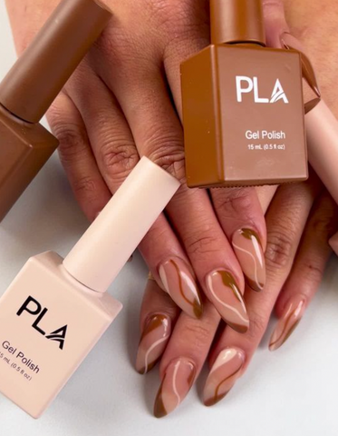Brown fall nails created by PLA Inc. 