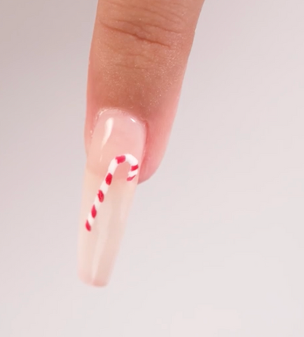 Candy cane nails, a classic – created with our Holiday Collection at PLA. 