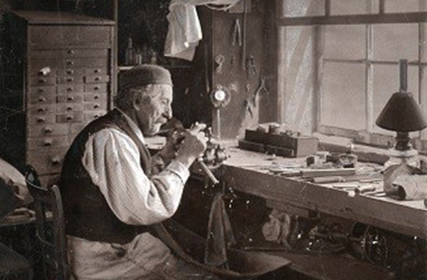 Watchmaker Valée de Joux Farmer works in his house During the Winter.jpg