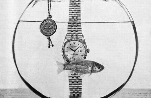 publicité-montre-vintage-étanche-bocal-poisson-rouge