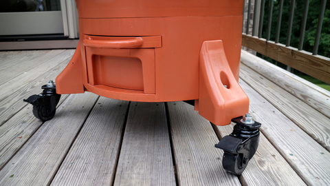 closeup of the base of a Garden Tower® with the wheel caster kit attached