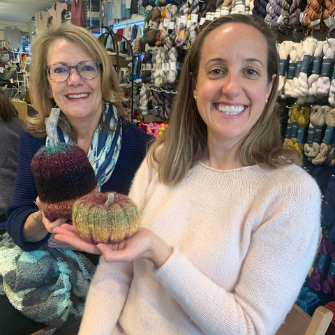 photo of customers holding Noro yarn pumpkins