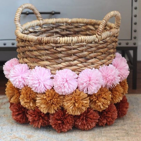 photo of basket with pom poms