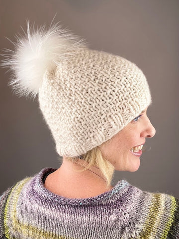 photo of woman in knit hat