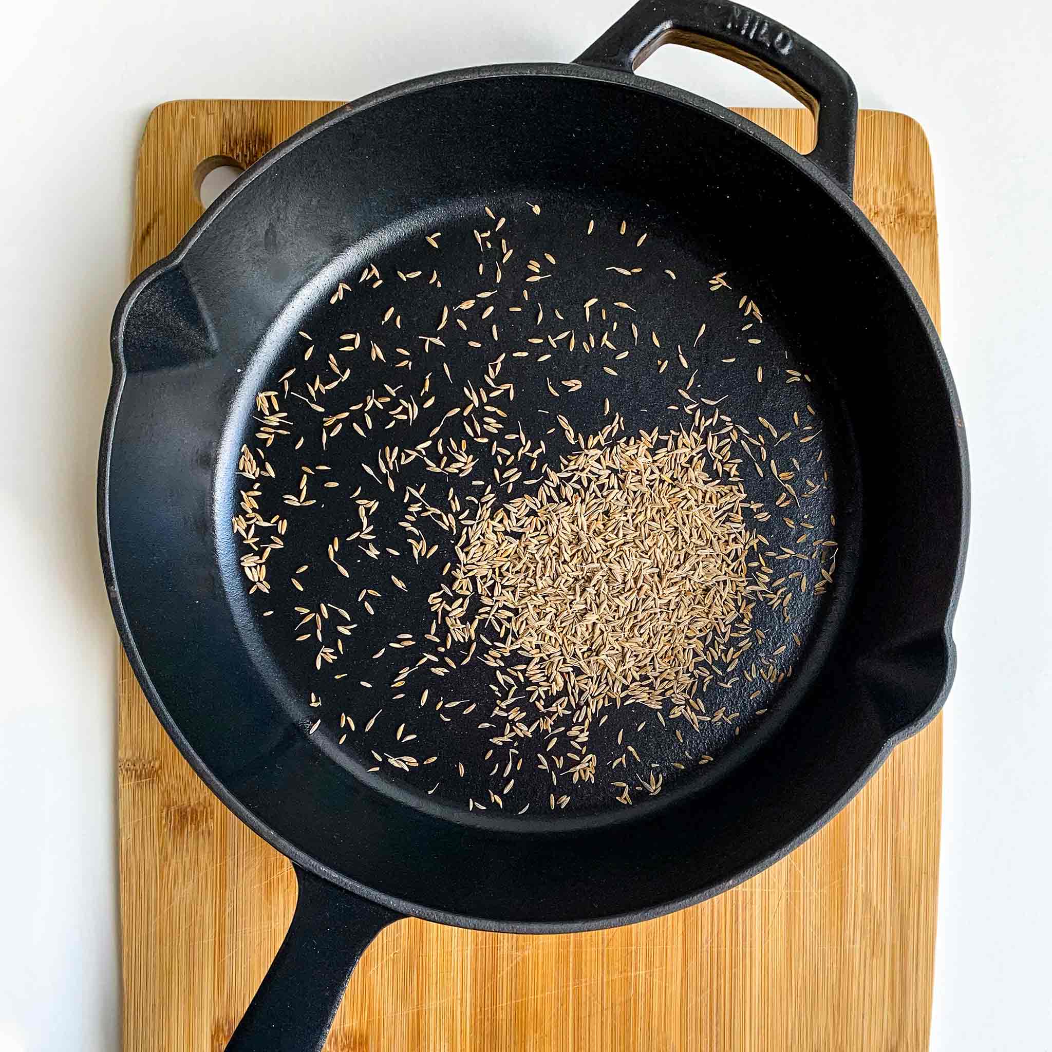 spices in cast-iron skillet