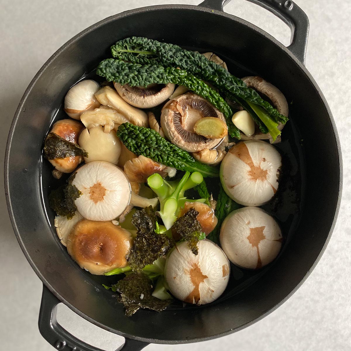 Mushroom and seaweed broth in a Dutch Oven