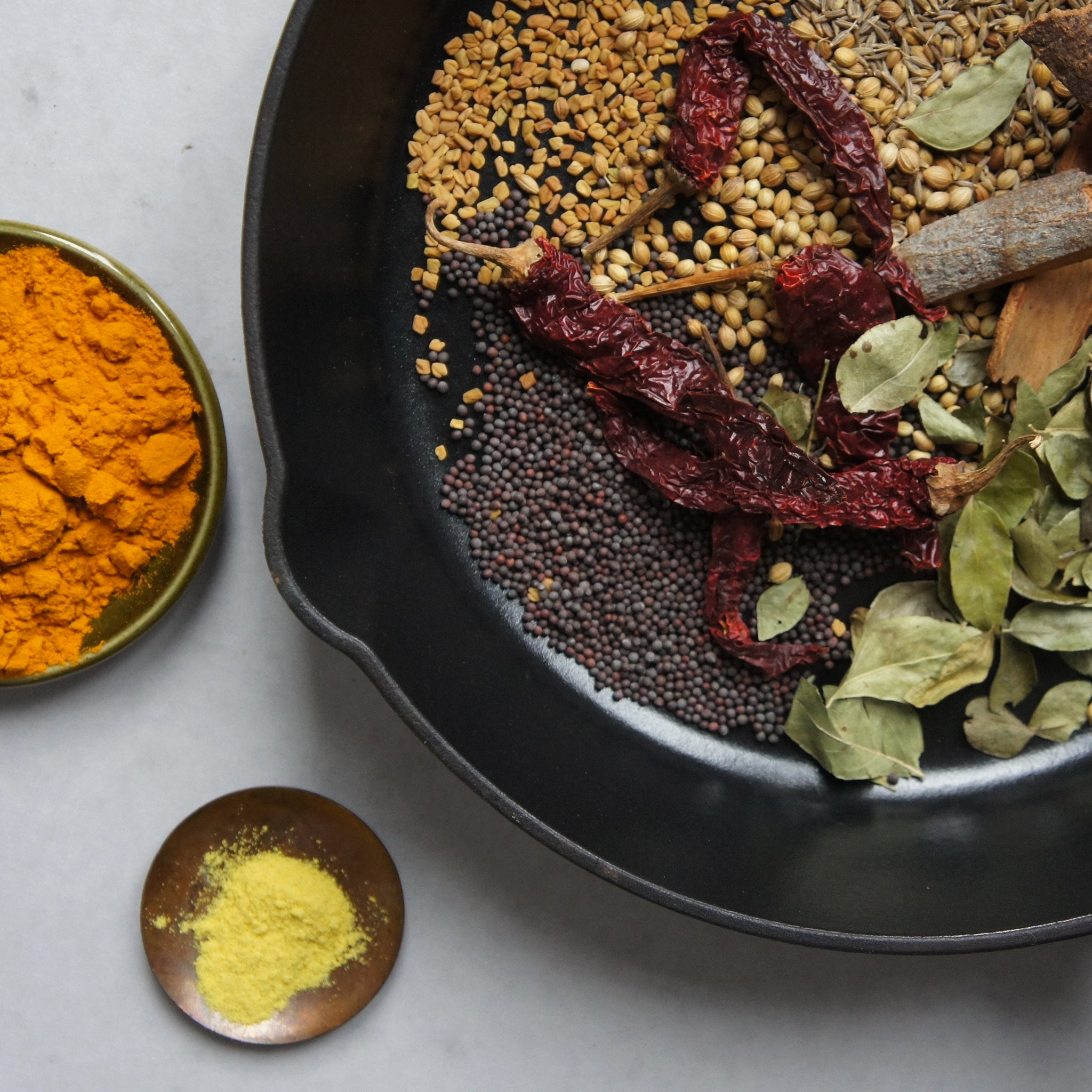 rasam spice blend in cast iron skillet