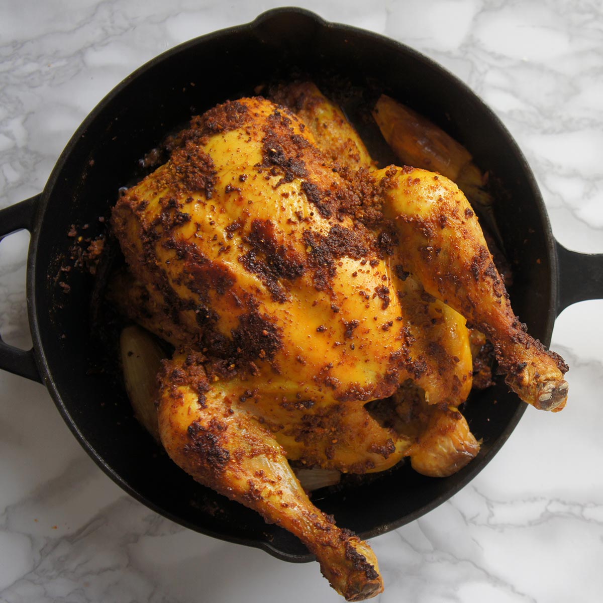 Roast chicken in a cast iron skillet