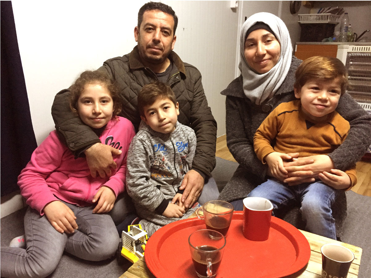 A family in a refugee camp in greece 