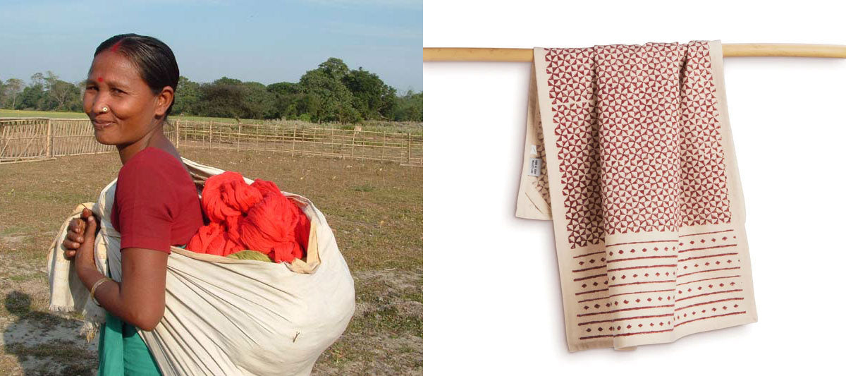 A woman in India carries our sustainably woven textiles