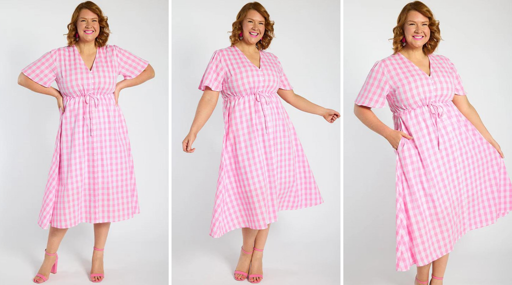 Model wearing pink barbie inspired outfit, pink gingham dress