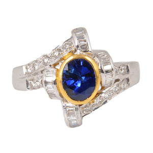 18KT White and Yellow Gold Ladies Ring with Oval Cut Natural Blue