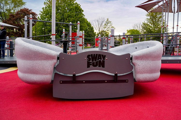 A photo of the Sway Fun Glider at the Jumpstart Inclusive Playground in Toronto, ON.