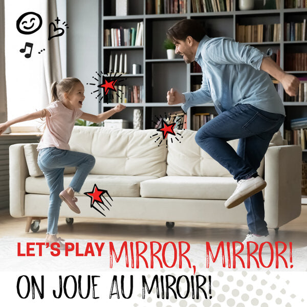 Let's Play Mirror, Mirror! A dad and his daughter stand facing each other in a living room, mirroring each other's stance. They are standing on one foot with one arm in front of them and the other reaching behind.