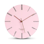 horloge murale design à couleurs pastel rose
