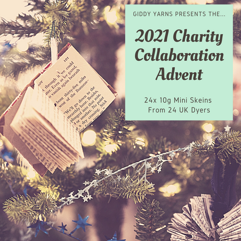 Image of a book ornament hanging off a Christmas tree. In the top right corner, a mint green box has text that says "Giddy Yarn Presents the 2021 Charity Collaboration Advent. 24 x 10g Mini Skeins from 24 UK Dyers"