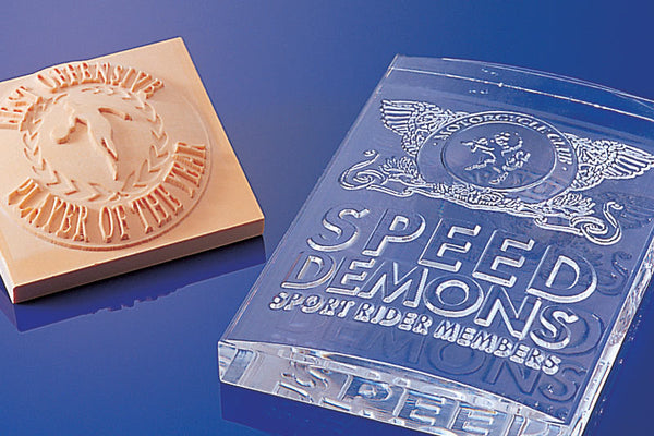 Engrave awards in a variety of materials