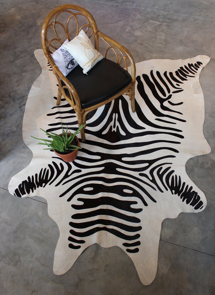 Zebra print cowhide rug