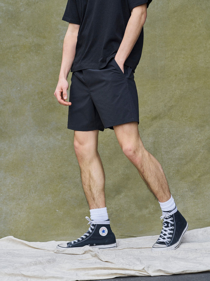 Model Wearing Trail Roam Short - Black - Side