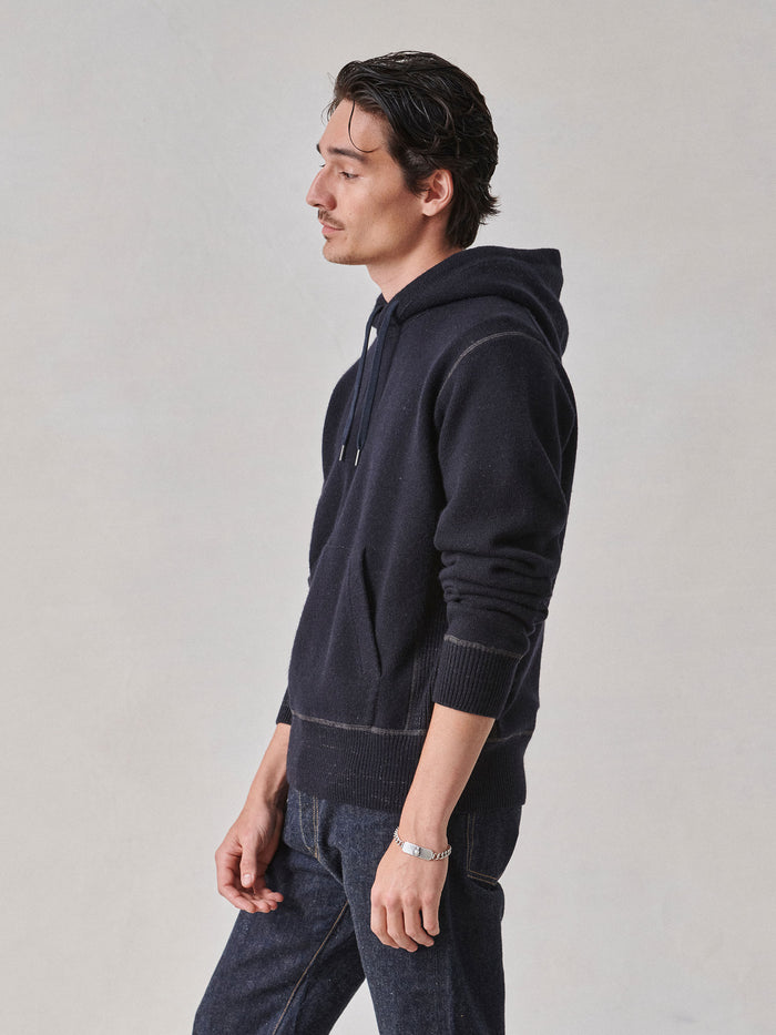 Model wearing Dark Navy Loopback Wool Hooded Sweatshirt - Side