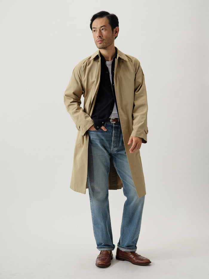 View of the Uniform Khaki Storm Stopper Belted Trench Coat