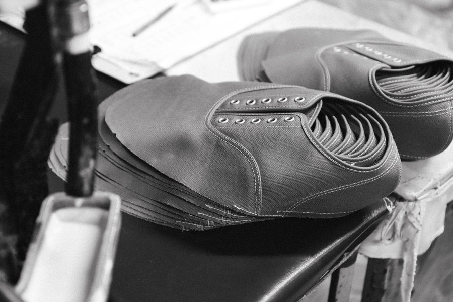 Meanwhile, the cotton uppers are fully finished before assembly.