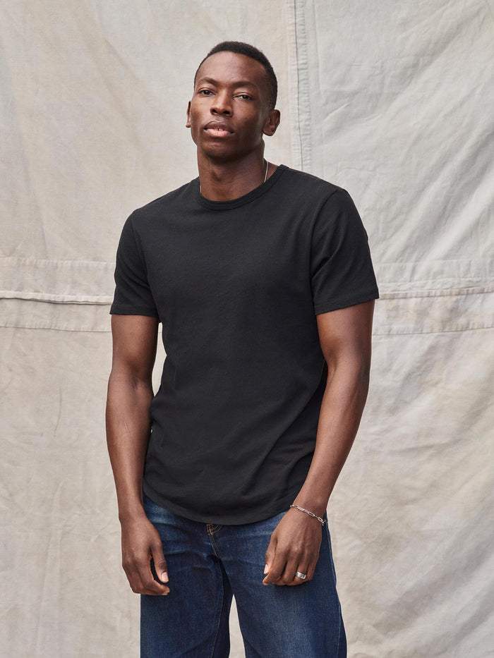 Model Wearing Black Costa Curved Hem Tee