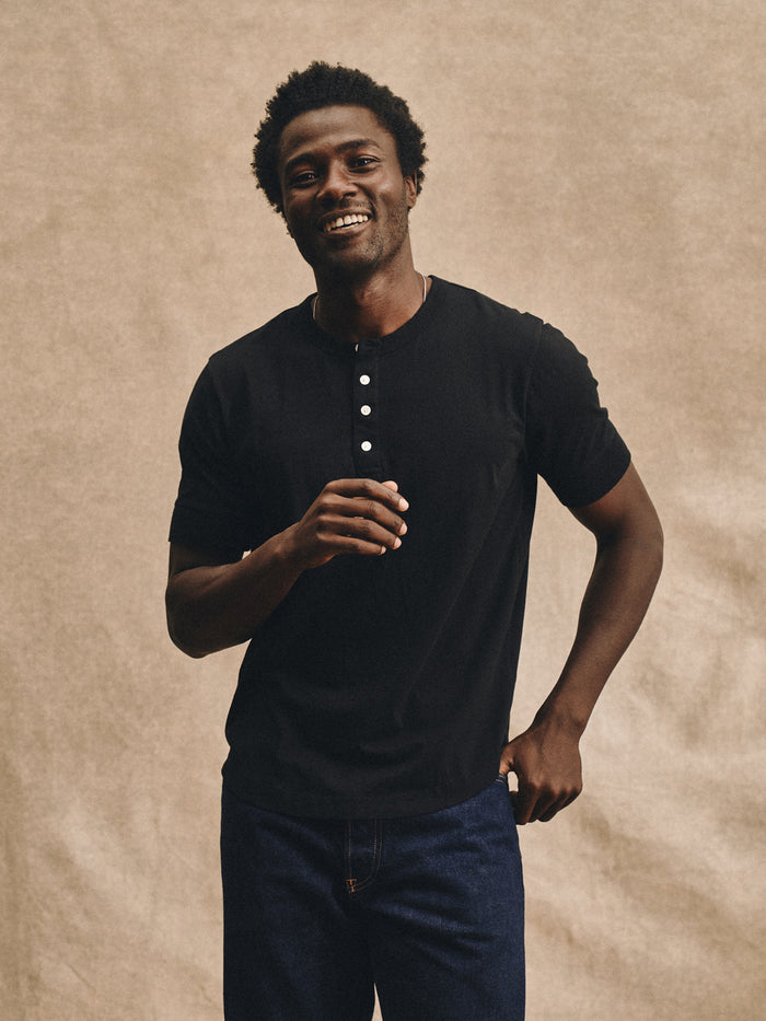 Model Wearing Black Pima Short Sleeve Curved Henley - Front 