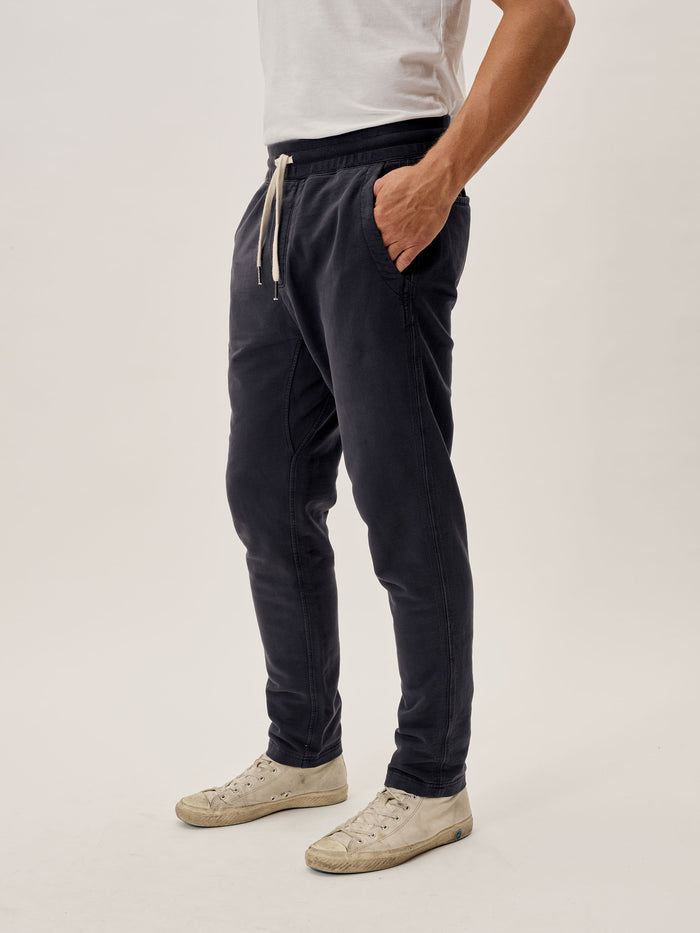 Model Wearing Storm Venice Wash Loopback Trouser - Side