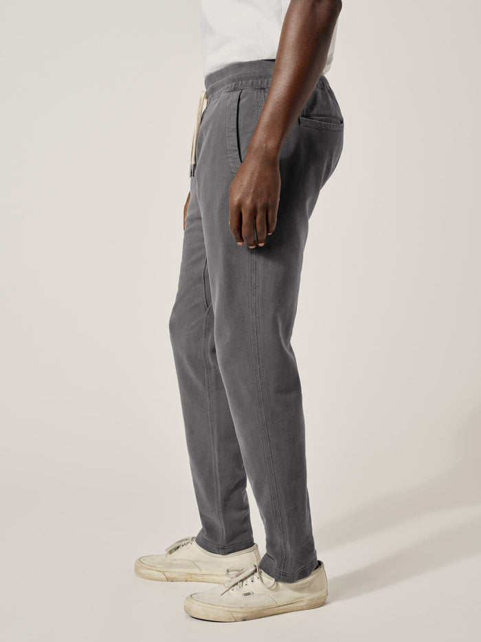 Model Wearing Faded Black Venice Wash Loopback Trouser