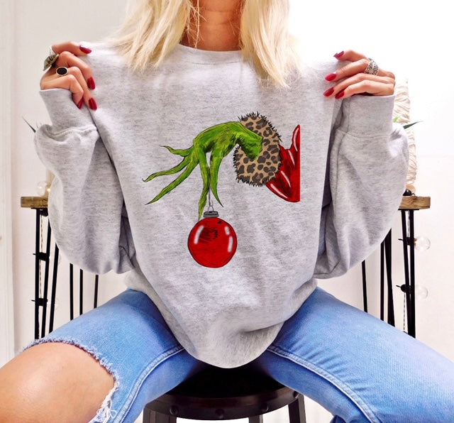 Grinch hand holding Louis Vuitton Ornament Sweatshirt