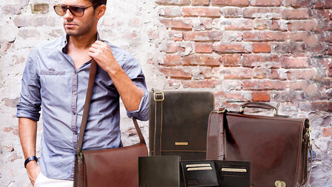 Man Posing with a range of Mens Leather Bags