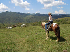 Holly, shop owner, with Luna the Horse in Honduras
