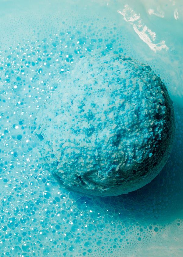 Beautiful Relax CBD Bath Bomb radiating its soft blue color.