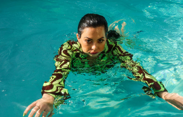 Kush Queen CEO takes a dip in the pool